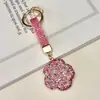 Chaveiro de argila com diamantes incrustados de camélia, pingente de bolsa, flor de rosa com diamante brilhante criativo, acessório de chaveiro de carro