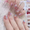 Parches de uñas ponibles con un toque de alta gama, populares en línea, en un estilo puro y deseable, dulces con pedrería en forma de corazón y cadenas, pegatinas para uñas postizas