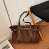 Bolsa tote de camurça e pelúcia retrô chique de nicho para mulheres outono grande capacidade elegante versátil para o dia a dia ombro único sob o braço