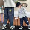 Calça jeans verde lisa com carinha sorridente para meninos, primavera e outono, calça casual bonita e versátil para crianças, calças infantis, comércio exterior