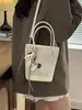 Bolso de Mano Moderno para el Trabajo y Salir, Nuevo Bolso de Hombro Bajo para la Primavera 2026, Bolso Cubo de Gran Capacidad