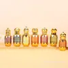 Botellas de Vidrio para Aceites Esenciales al por Mayor, Botellas de Spray para Perfume, Botellas con Rodillo, Botellas Dispensadoras Cosméticas Electroplateadas, Botellas Estampadas en Oro