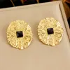 Pendientes geométricos de lujo ligero vintage con goteo de aceite, populares en Europa y América, estilo de mediados de siglo, acero inoxidable chapado en oro, pendientes decorativos diarios para mujer