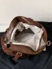 Bolsa de ombro retrô elegante e de alta qualidade, nova para 2026, de grande capacidade para o dia a dia, com um design de bolsa tote descontraído, plissado e de cor sólida