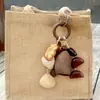 Cáscara de Fruta Natural Campana de Mano Agitada Carrillón de Viento Producto Terminado Muñeco de Vaina Instrumento Musical Curativo Colgante Planta Colgante de Bolsa de Fruta Regalo No