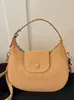 Bolso de mano pequeño retro Yaozi para mujer, nuevo estilo 2026 bolso de mano con forma de media luna, bolso de hombro versátil y simple, bolso de axila tipo empanadilla