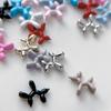 Ornamentos de unhas de liga de cachorro bola tridimensional transfronteiriços, explosões de celebridade da internet, desenhos animados, cor, gota de óleo, ornamentos de unhas por atacado