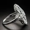 Nuevo Anillo de Topacio y Zafiro Estilo Palacio Exagerado de Lujo Ligero Transfronterizo Europeo y Americano Huajie con Accesorios de Patrón Hueco