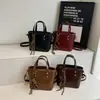 Bolso de moda de alta gama estilo vintage para mujer, bolso de mano de nicho de lujo ligero, versátil para el uso diario, bolso cruzado