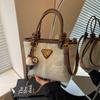 Bolsa Balde Portátil Tendência Versátil Feminina 2025 Nova Moda Casual Bolsa de Ombro Bolsa de Mão Toque de Alto Padrão para Mulheres