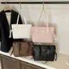 Bolso tote para mujer, nuevo estilo 2026, diseño moderno y minimalista, patrón tejido, adecuado para el trabajo y los desplazamientos, bolso de hombro para mujer, transfronterizo