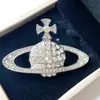 Broche Saturno Diamante Completo Emperatriz para Mujer, Accesorio de Moda Otoño e Invierno, Elegante y Lujoso Planeta Grande Versátil Broche de Tendencia