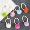 Nuevo llavero con colgante de bola de pelo, cadena de cuentas, pequeño, fresco, blanco brillante, accesorios de cadena, gancho para puerta pintado, funda para auriculares, decoración