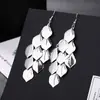 ¡Guau!Moda Transfronteriza Europea y Americana, Varios Pendientes Largos Metálicos de Borla Exagerada de Estilo Moderno con Elementos Elegantes