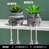 Sencilla creativa muñeca de pies colgantes cilindro de cemento simulación planta suculenta maceta sala de estar decoración del hogar fabricantes mayoreo