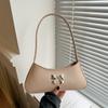 Bolsa pequena de axila de alta qualidade para mulheres 2024 Nova moda Bolsa de ombro para todos os gostos Design de nicho Bolsa de mão baguete da moda