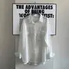Camisa fina de proteção solar transfronteiriça europeia e americana com bolsos texturizados, camisa/cardigã feminino francês de manga comprida, novo estilo