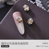 Manicura pila caja de regalo de joyería de diamantes con garra aleación diamante amor rojo intermitente Año Nuevo uña metal accesorios de diamantes