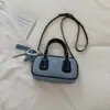 Nova moda outono de 2026, bolsa Boston simples texturizada, bolsa de ombro e transversal vintage de alto valor em formato de travesseiro