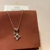 Bestseller de Xiaohongshu Set de Cuatro Piezas Concha Corazón Circonita Cruz Sonriente Circonita Trébol de Cuatro Hojas Colección Dropshipping
