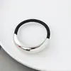 Estilo punk europeo y americano metal personalidad alta calidad cuerda para la cabeza semicírculo tubo redondo anillo para el pelo cuerda elástica para el pelo Balot fabricantes al por mayor