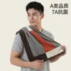 Toalla de algodón de clase A, hilo teñido a rayas, gruesa, absorbente, suave, para adultos, para el hogar, venta al por mayor