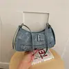 Bolsa de ombro/transversal minimalista com rebites 2026 para mulheres, nova tendência de outono, design chique de nicho