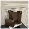 Bolso de Color Sólido para Viajes de Negocios para Mujer 2025 Otoño e Invierno Nueva Moda Simple de un Solo Hombro Cruzado Bolso de Suegra Estilo Extranjero Bolso Cubo