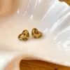 Pendientes de Botón Ovalados de Resina Transfronterizos Europeos y Americanos Pendientes Maillard de Otoño e Invierno Pendientes Simples de Moda Versátiles para Mujer Sensación de Alta Gama