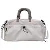 Bolsa de viaje de gran capacidad para mujer 2026, bolso de mano transfronterizo ligero, bolso cruzado deportivo y de fitness para hombre, bolsa de equipaje para viajes cortos