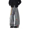 Jeans wide leg retrô americano com bordado de desenho animado, cinto xadrez, lavagem desgastada e corte reto até o chão para homens e mulheres