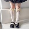 Meias infantis primavera e verão arco laço princesa pilha meias meninas coreanas Lolita bezerro fabricantes