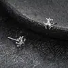 Novos brincos de flor de íris transfronteiriços para homens, acessórios de orelha de nicho, únicos e modernos, acessórios da moda e luxuosos de alta qualidade para mulheres