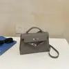 Bolsa transversal de alta qualidade, elegante, com temperamento de socialite, para mulheres, outono, luxo leve, nicho, bolsa Kelly, bolsa de ombro retrô e estilosa