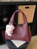 Bolsas de Mujer Transfronterizas Nuevo Modelo 2026 Principios de Primavera Retro Estilo Canasta Versátil Bolso de Mano Moda Nicho Bolso de Hombro Cruzado Tendencia