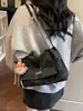 Bolsa Tote de Ombro Único Exclusiva Versátil Transfronteiriça Design de Nicho Moda de Trabalho Outono 2026 Bolsa de Ombro Alta