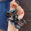 Vehículo de construcción de aleación caricatura creativa mini mochila colgante de llavero clip de regalo muñeco máquina juguete especial venta al por mayor
