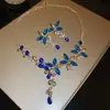 Traje de collar y pendientes de diamante ovalado europeo y americano exagerado luz de lujo alta gama cadena de clavícula nicho moda joyería al por mayor