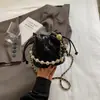 Bolso de cadena con patrón de rombos, bolso tipo cubo de alta moda estilo coreano, nuevo bolso de hombro y cruzado de moda nicho para mujer primavera 2026