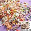 Por peso, stock sobrante de cabezas de flores simuladas, flores artificiales, pasadores para el cabello de bricolaje, materiales para coronas Hanfu, decoraciones de boda y tela de seda.