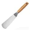 Artículos de Cocina Transfronterizos: Batidor de Huevos de Madera para el Hogar, Cuchara para Helado de Acero Inoxidable, Cortador de Pizza, Prensa de Ajo, Juego de Ralladores