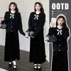 Ropa de maternidad otoño e invierno nuevo conjunto negro de tres piezas estilo coreano cárdigan con lazo falda de lunares capa interior de encaje que cubre el vientre ajuste ceñido