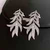 Pendientes de Aguja Plateada con Borlas de Hoja Incrustadas de Diamantes, Pendientes de Botón Vintage Exagerados con un Diseño Único para Mujer