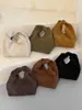 Bolsa de Mão Feminina Suede Moda Cor Sólida Estilo Coreano Única de Alto Valor para o Dia a Dia