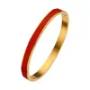 Elegante Pulsera Brazalete Chapada en Oro con Incrustaciones de Esmalte Azul Diseño Elegante y Moderno Perfecta para Uso Casual y Formal Ajustable para un Ajuste Cómodo Accesorio Elegante y Atemporal para Elevar Cualquier Atuendo