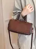 Nuevos dijes para bolso Otoño/Invierno 2026 Forma horizontal simple Bolso versátil de alta gama para mujer Bolso de mano vintage