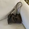 Bolsa Saco Simples e Única Estilo Coreano Moda Inverno 2025 Nova Bolsa de Mão Versão Coreana Bolsa de Ombro Transversal Ins