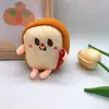 Nuevo llavero de peluche muñeco lanzable fabricantes de máquinas dispensadoras al por mayor dibujos animados mochila escolar muñeco de 4 pulgadas colgante regalo