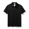 Nova Camisa Polo de Manga Curta Primavera e Verão 2026 Masculina Business Casual Gola Lapela Camiseta Solta Cor Sólida Top Camiseta