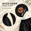 Pantalones deportivos infantiles de estilo europeo y americano, versión coreana, diseño color block, pantalones deportivos casuales para primavera y otoño, con puños elásticos
